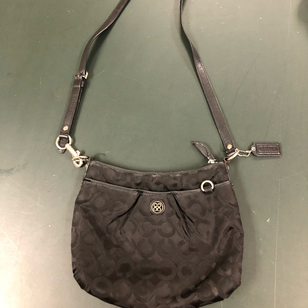 Small/ medium cross body coach bag. Used condition